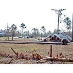 Home and vehicle damage west of Waveland, Mississippi. <br> On Pearlington Rd. 2 mi west of Lakeshore Rd.