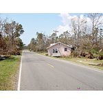 Surge relocated home to roadside, west of Waveland, MS.