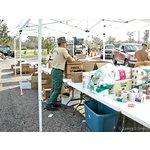 Fla. Div. of Forestry and Ohio Nat'l Guard 838th MP Co. <br> distribute FEMA water, ice, and MREs to victims of <br> Hurricane Katrina at POD 58, Necaise, Mississippi.