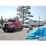 Pink Panther tow-truck pulls semi from ditch at POD 58. <br> Accident temporarily delayed distribution of water.