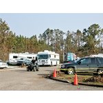 Emergency and support vehicles reach Hancock Co., MS. <br> Manatee Co., FL Sheriff's Dept. mobile kitchen, <br> portable showers, and a varied fleet of support vehicles <br> support Hurricane Katrina relief efforts.