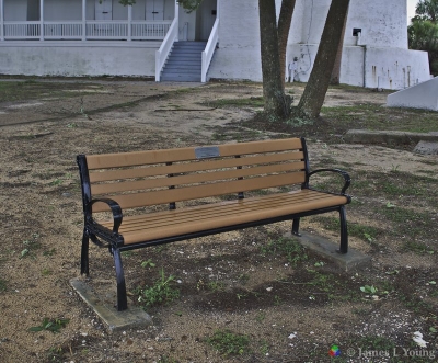 Photo of the new John’s bench with the lighthouse in the background. (04-04-2017) - St. Marks National Wildlife Refuge.