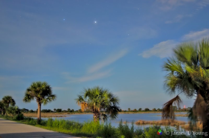 Lighthouse pool illuminated by rising full moon after sunset. It looks like daylight photo but with stars. (08-07-2017) - St. Marks National Wildlife Refuge.